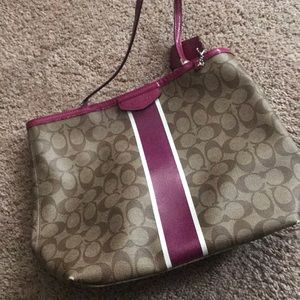 Pink and brown coach purse